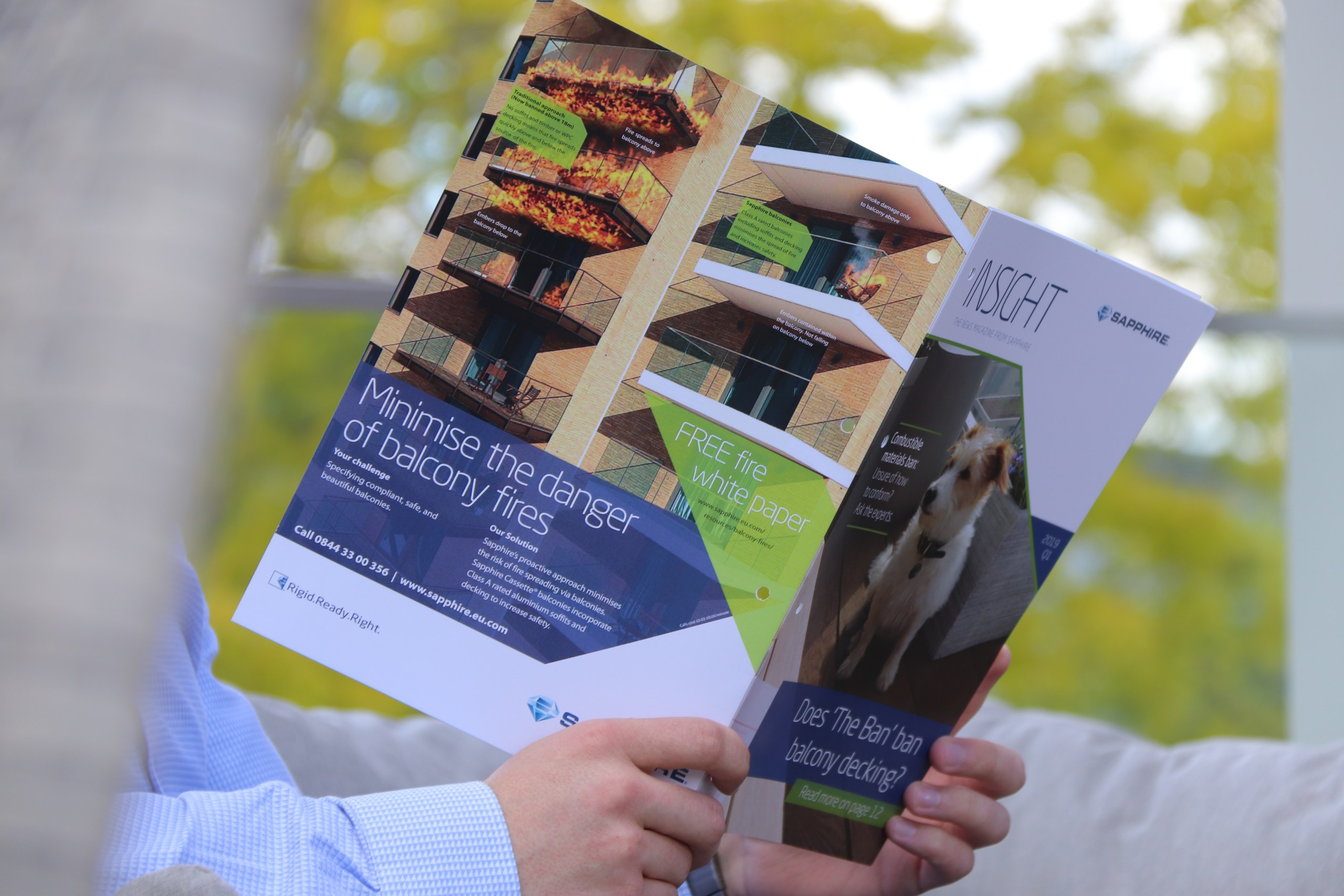 Sapphire Insight magazine being read on a balcony